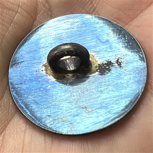 A 19th c. Steel button with cross and flowers.