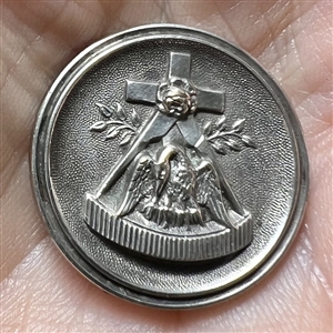 White metal button of Rosy Cross “The Pelican feeding its young with its own blood”.