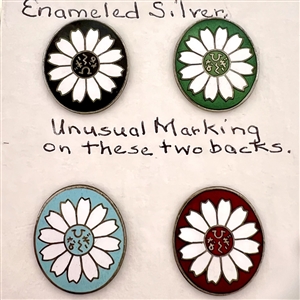 Set of six enameled silver buttons of flowers.