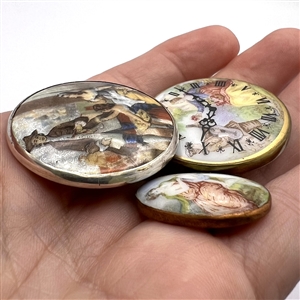Three studio porcelain buttons by Phil Linley.