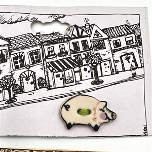 Four cards of “Hands Work” ceramic buttons of farm animals.
