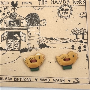 Four cards of “Hands Work” ceramic buttons of farm animals.