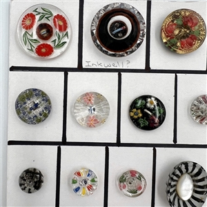 Twenty five assorted reverse carved and painted glass buttons.
