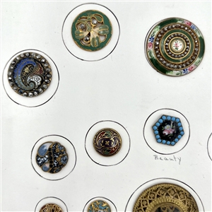 Card of twenty five enamel buttons.