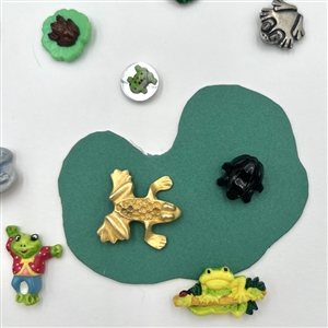 Card of twenty eight frog buttons.