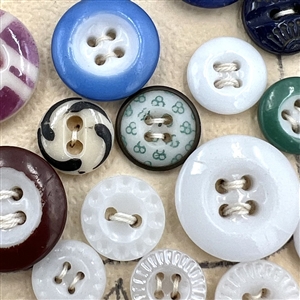 Card of 160+ china buttons.