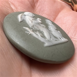 “Cherub by a brassier” Jasperware studio button by Marie La Barre Bennett.