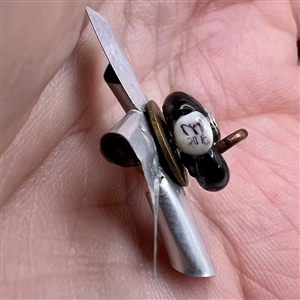 Mary Gaumond’s movable pinwheel studio button.