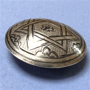 Niello silver button of interlocked star.