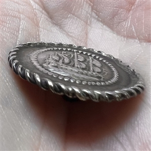 Continental silver button of a sailing ship.