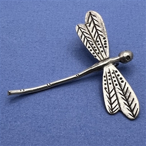 Large realistic white metal dragon fly button.
