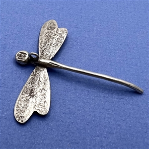 Large realistic white metal dragon fly button.