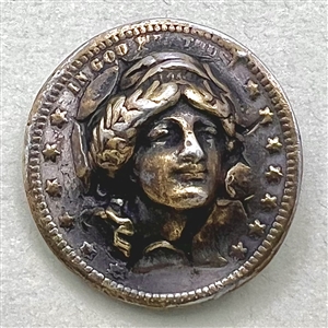 Coin-type metal button of lady liberty. 