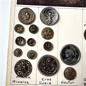 Card of twenty one mythological buttons. 