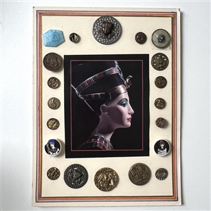 Card of twenty Egyptian buttons.
