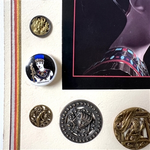 Card of twenty Egyptian buttons.
