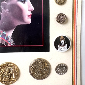 Card of twenty Egyptian buttons.