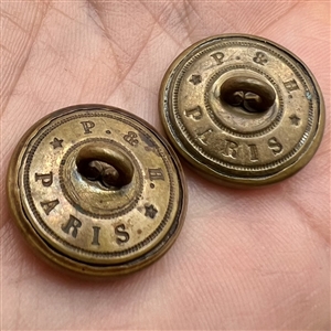 Two Liverpool transfer buttons of Egyptian pharaohs. 