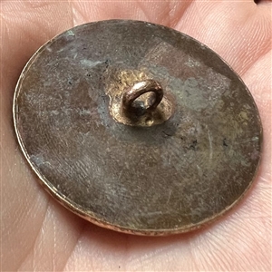An unusual 18th c. Chased copper Colonial button of wavy pattern.