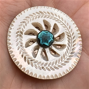 An 18th c. carved mother of pearl  button with aqua paste pin shank.