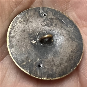 “Horse Race” brass button.