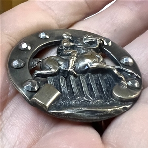 “Steeple chase” brass button.