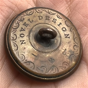 French sporting button of men fly fishing.