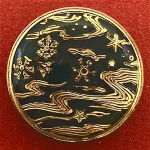 Blue green glass button of a sea design