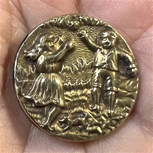 Brass button of boy and girl and playing catch with a ball.