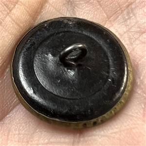 Brass button of boy and girl and playing catch with a ball.