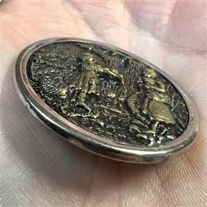 RARE large “Crossing the Stream” brass button.