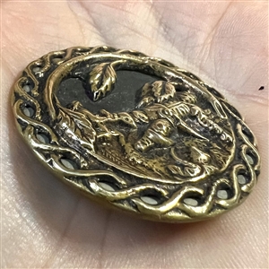 Large “Hop O’ My Thumb” brass button.