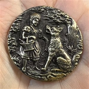 Scarce large “Red Riding Hood and the Wolf” brass button.