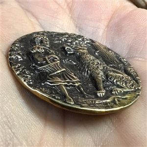 Scarce large “Red Riding Hood and the Wolf” brass button.