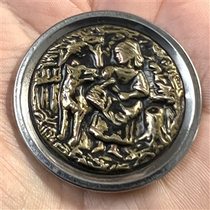 Large “Red Riding Hood and the Wolf” brass in metal button.