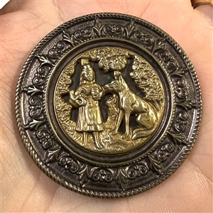 Heavily tinted “Red Riding Hood and the Wolf” brass with tinted border button,