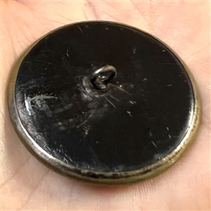 Heavily tinted “Red Riding Hood and the Wolf” brass with tinted border button,
