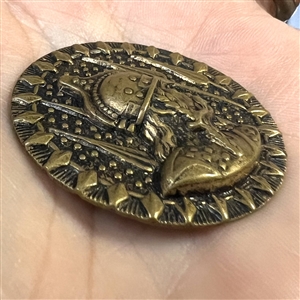 “Meroweg, King of the Stain Franks” brass button. 