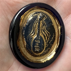 Bimini cobalt blue glass button of a mandolin.