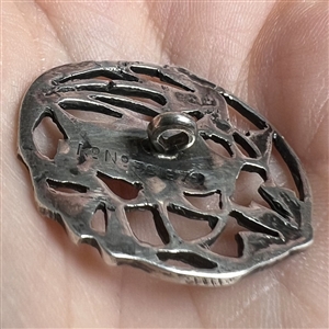 Silver button of a flower.