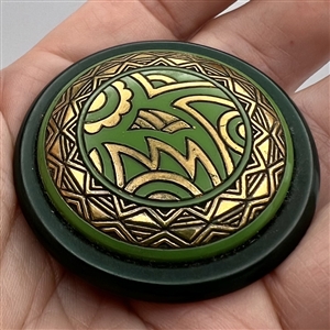 Art Deco Green glass button design set in celluloid.