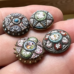 Four Italian mosaic buttons in assorted patterns.