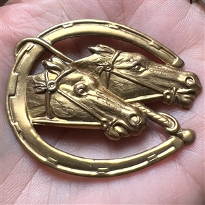 Kevin Kinne horse heads studio button.