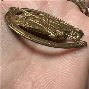 Kevin Kinne horse heads studio button.