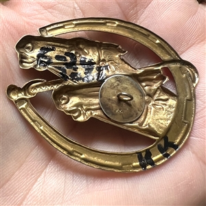 Kevin Kinne horse heads studio button.