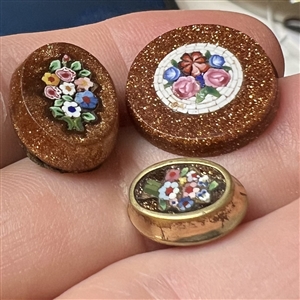 Three Italian micro mosaic buttons of flowers.