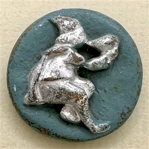 Acrylic shot (?) button of a piper.