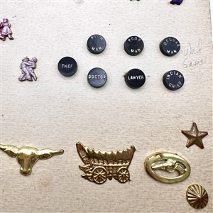 Card of 40 Goofie buttons and 9 trim.