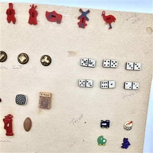 Card of 40 Goofie buttons and 9 trim.