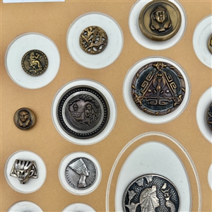 Card of twenty nine Egyptian themed buttons.